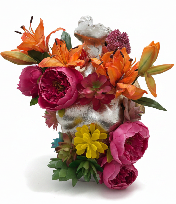 Broken Statue with Blooming Flowers