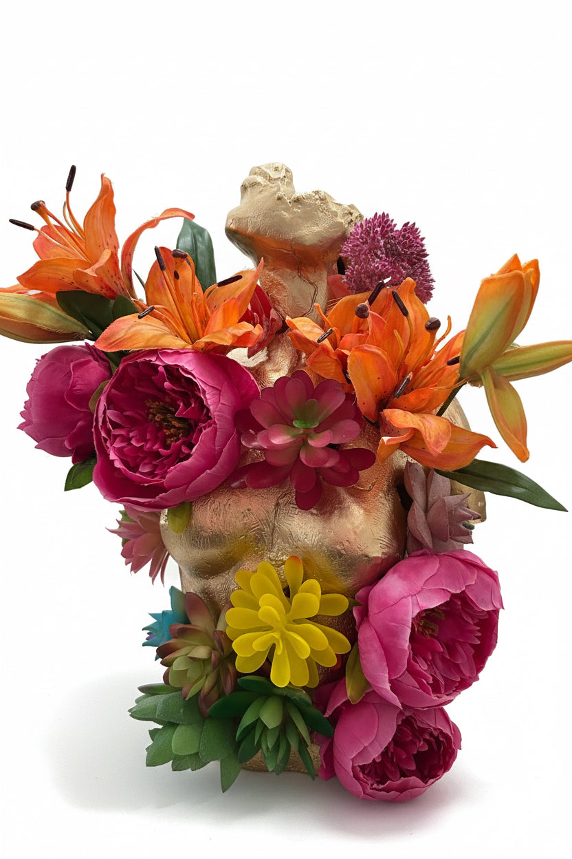 Broken Statue with Blooming Flowers