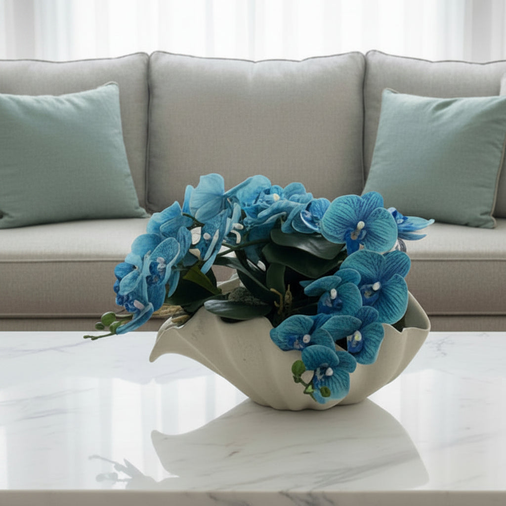 Seashell Vase with Blue Orchids