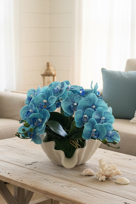 Seashell Vase with Blue Orchids